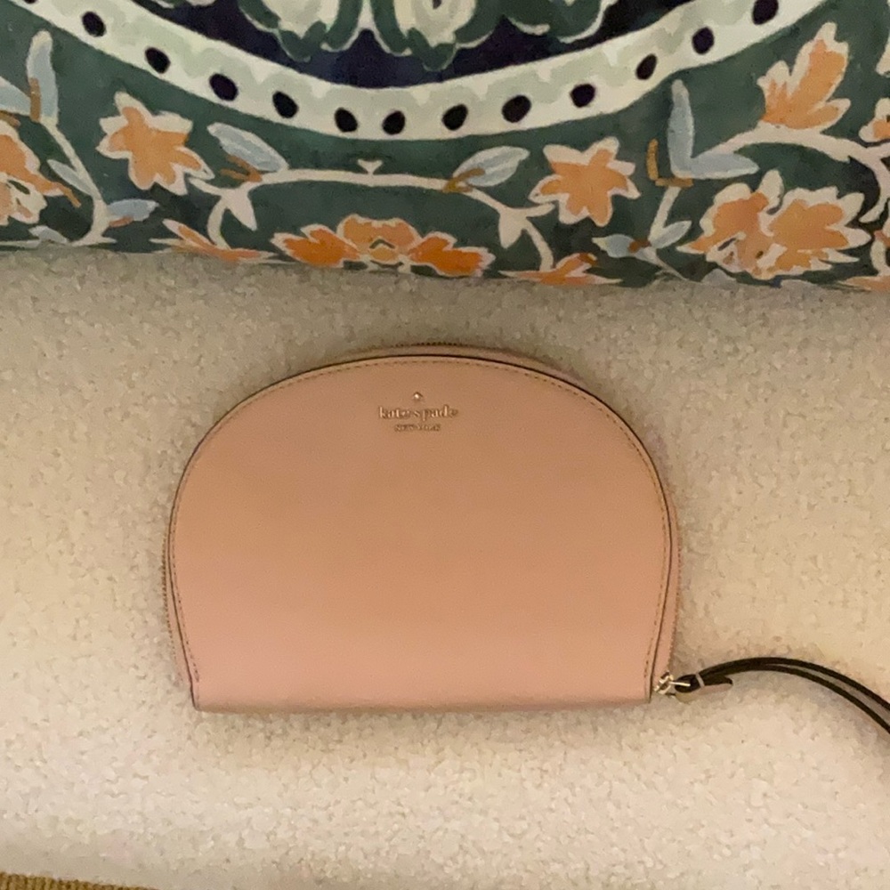 Kate Spade Pink wristlet with Modern Minimalist Design